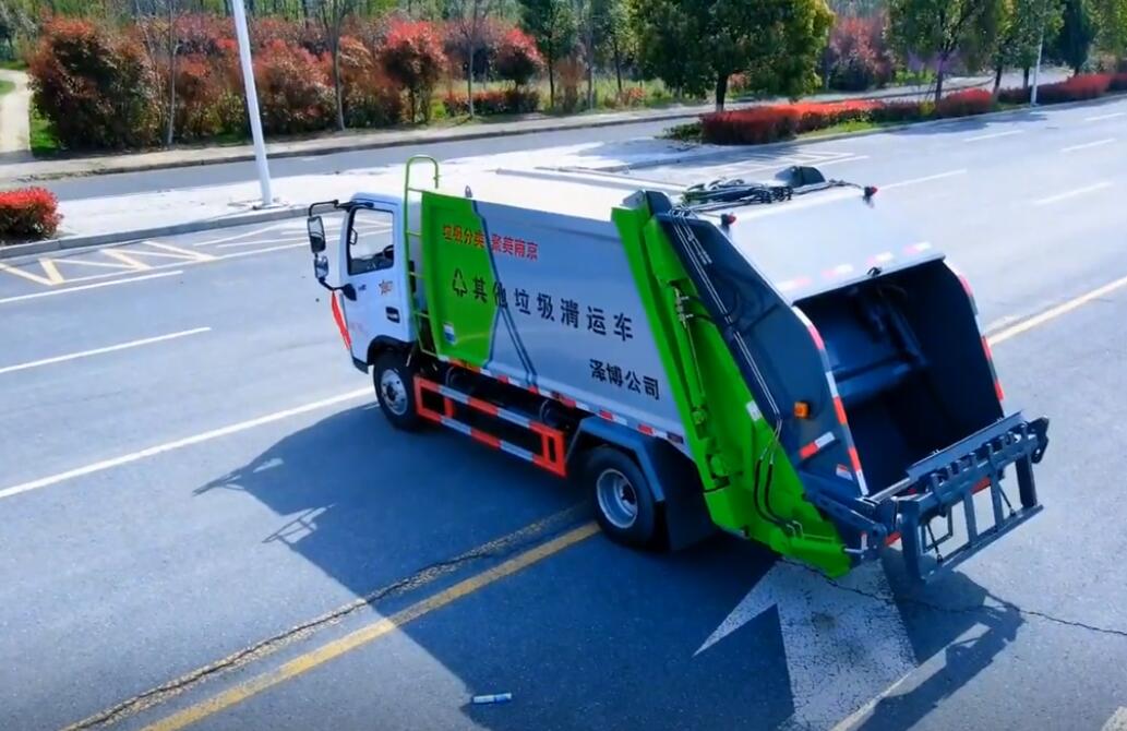 国六东风多利卡6方后装压缩式垃圾车视频